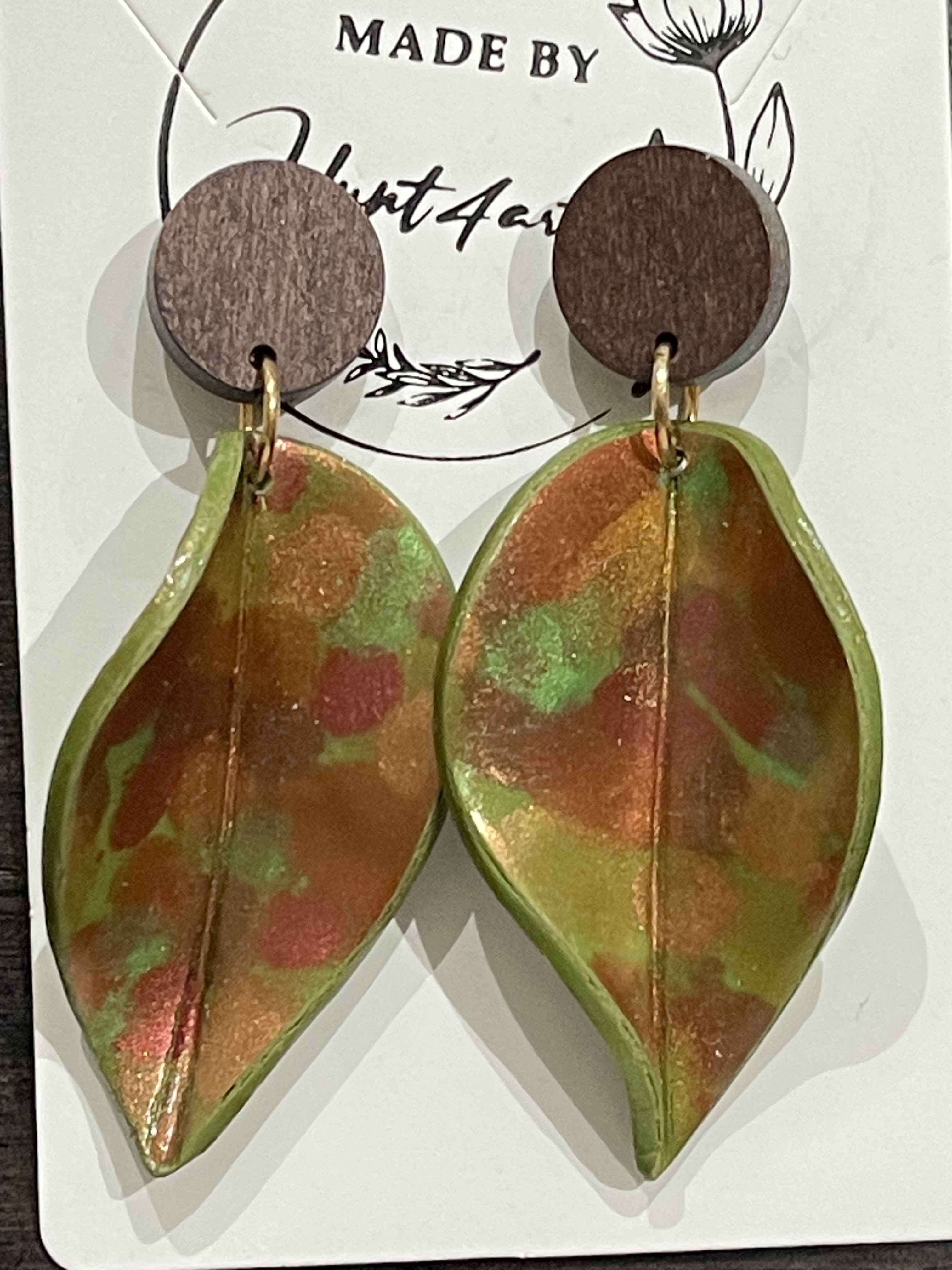 Earrings green twisted leaves