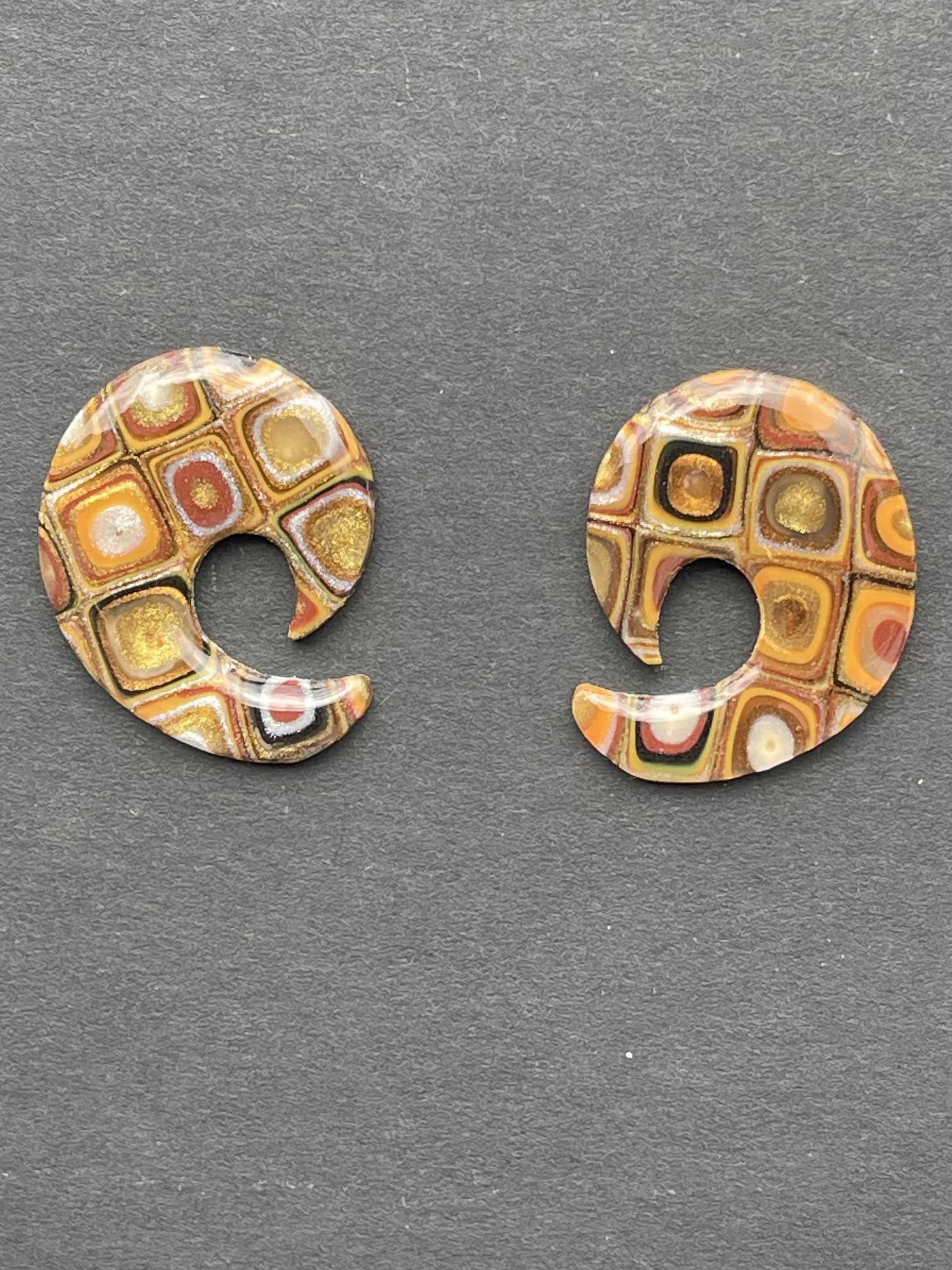 Gustav earthy tones crescent studs